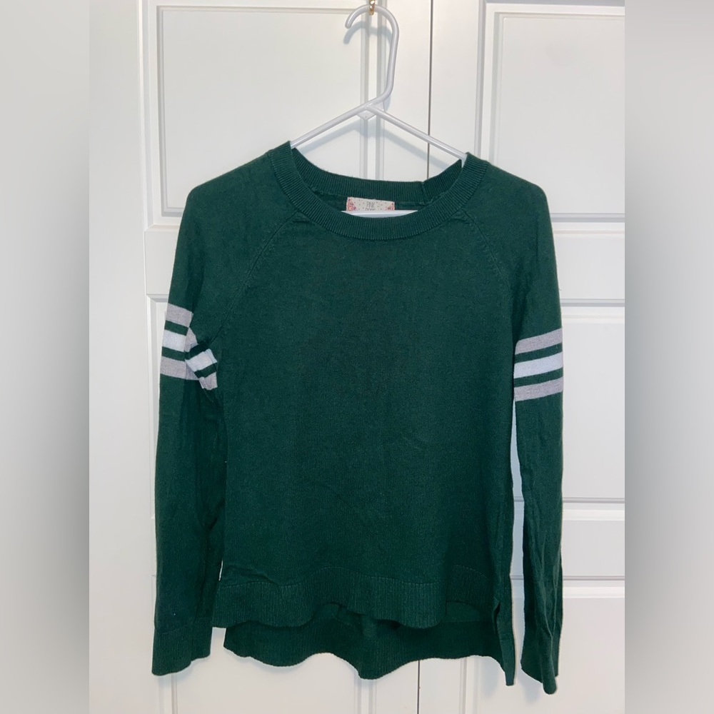 This is a dark green sweater perfect for a fall day!
